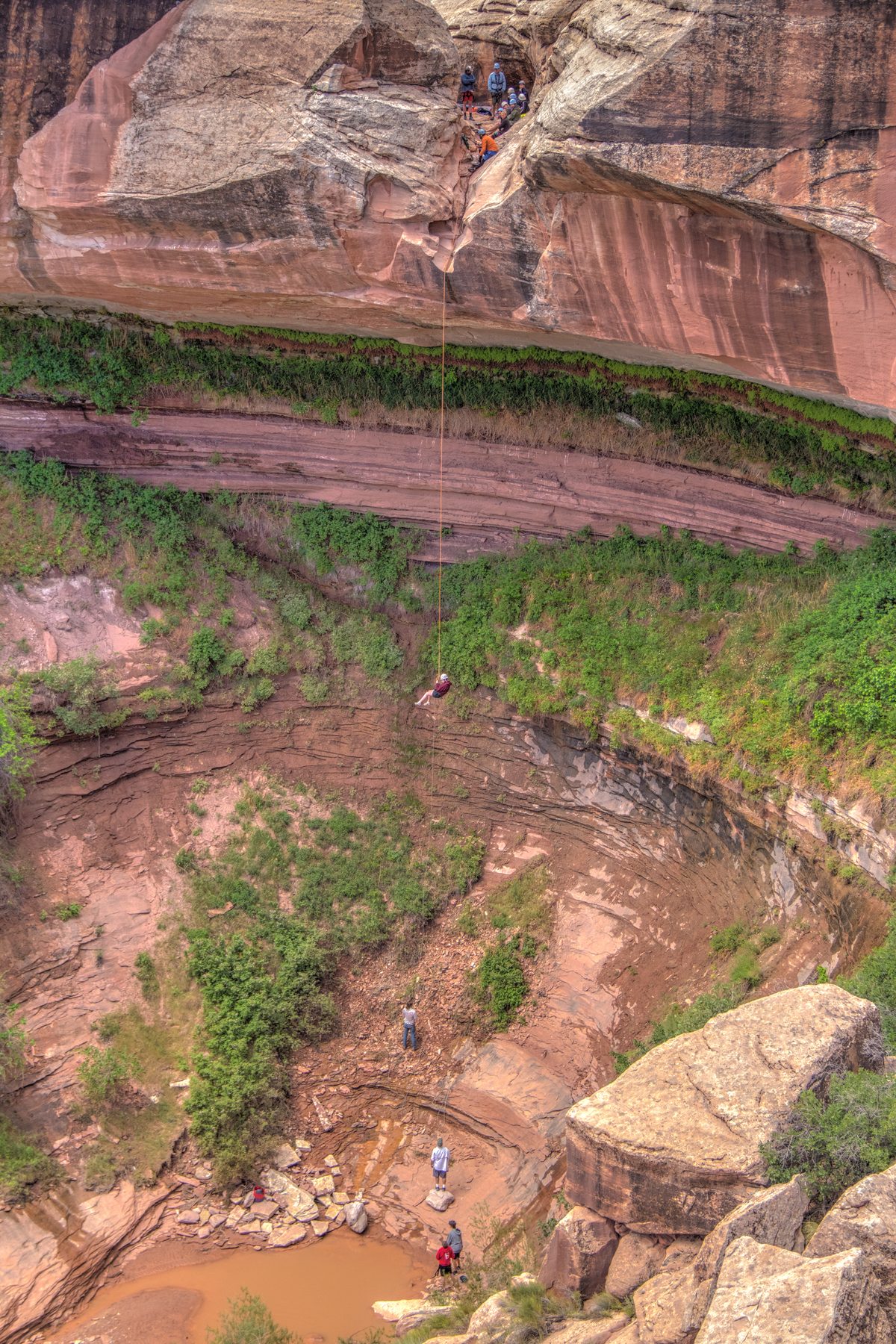 Guides and canyoneers on a multi-day backcountry canyoneering expedition