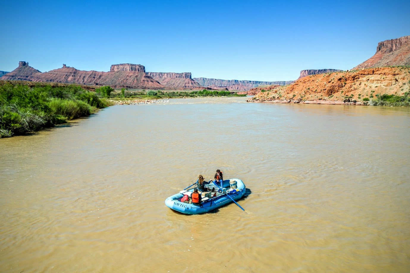 A NAVTEC raft on a calm half-day float down the Colorado River near Moab